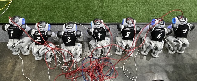 Seven Robots Charging and Getting new Software