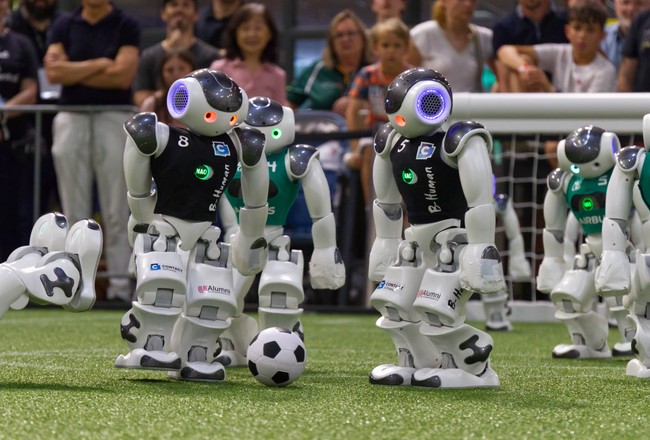 Two Robots - One Ball