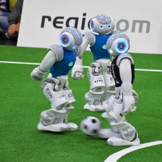 Fighting for the ball in midfield